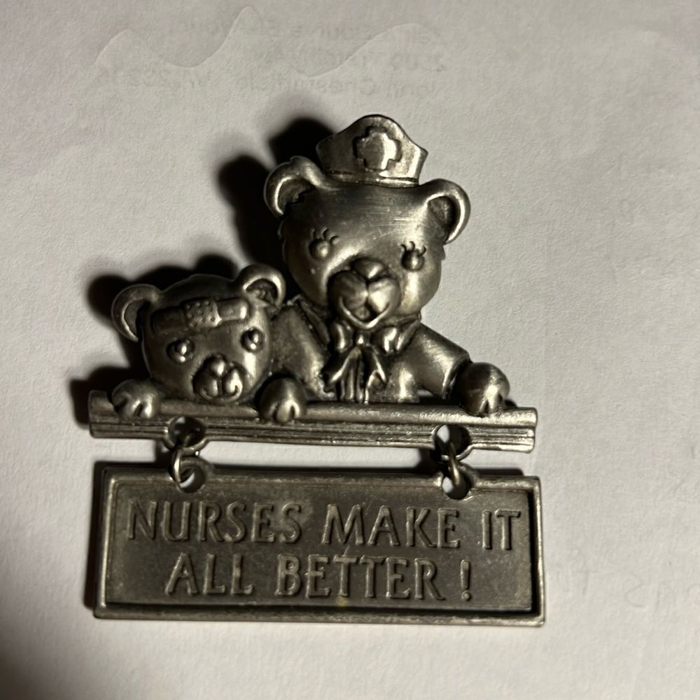 Vintage JJ pin Brooch pewter nurse & bear.